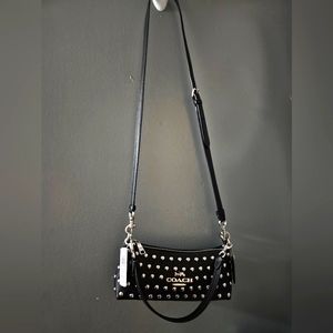 Nwt Coach black leather crossbody with rivets.